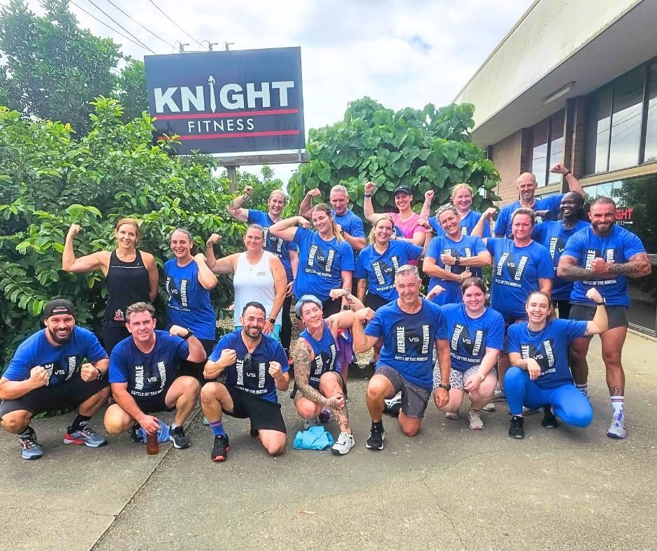 Big Bootcamp group flexing after a session