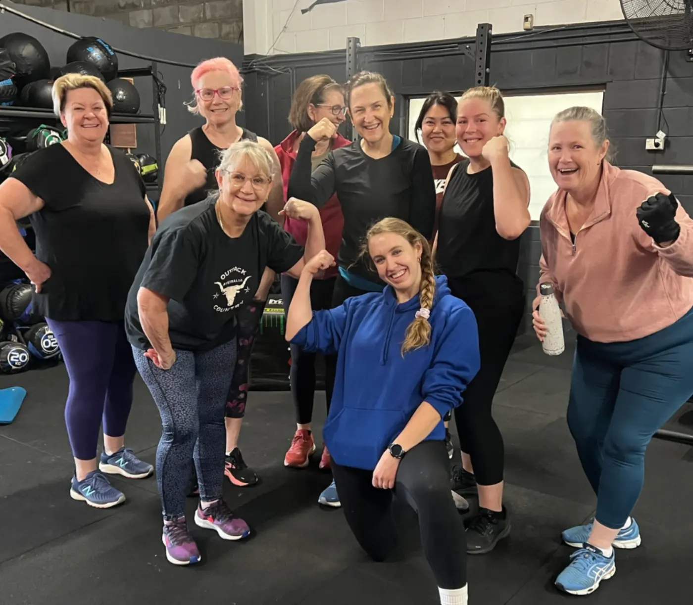 Women's Club members of all ages flexing together after a session at Knight Fitness Lawnton