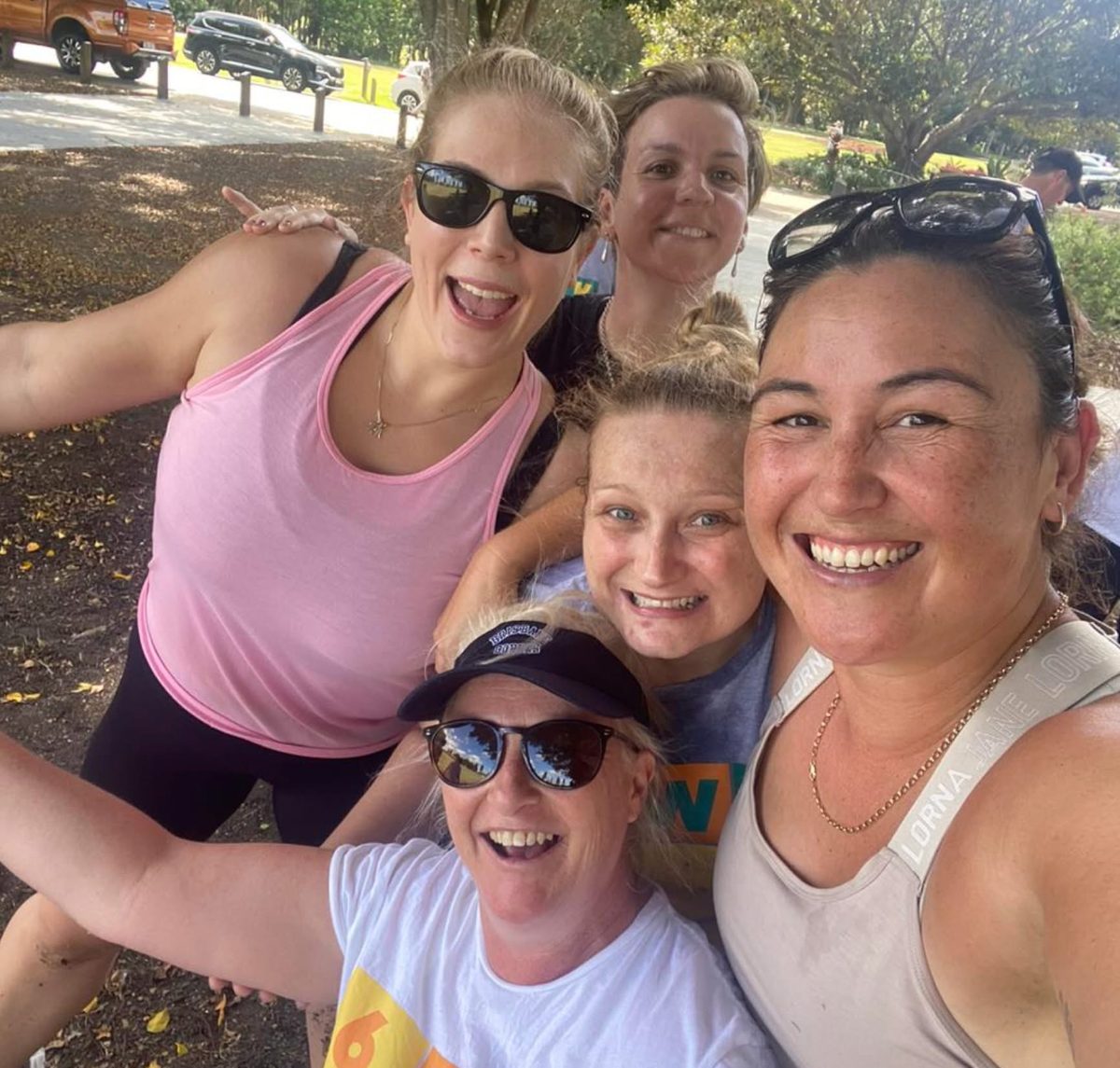 The Women's Club crew together at a community park session